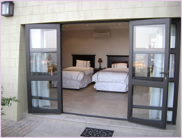 Another view of bedroom 4 in the Zimbali Holiday Home's Acaciawood villa